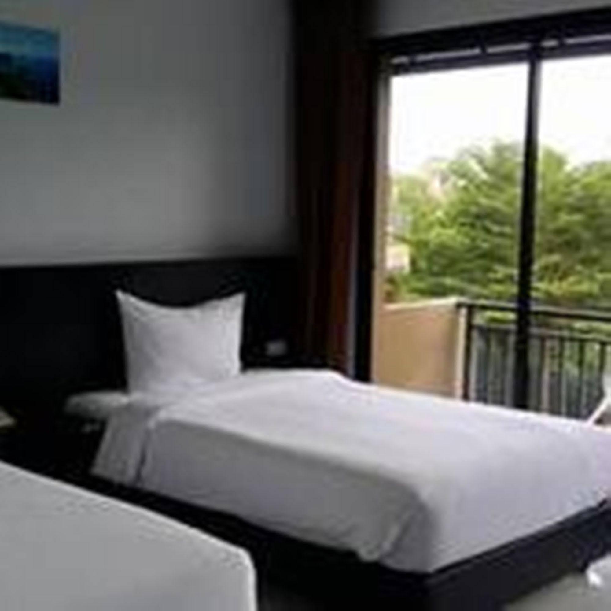 Naiyang Beach Hotel Sha Plus Пхукет Экстерьер фото